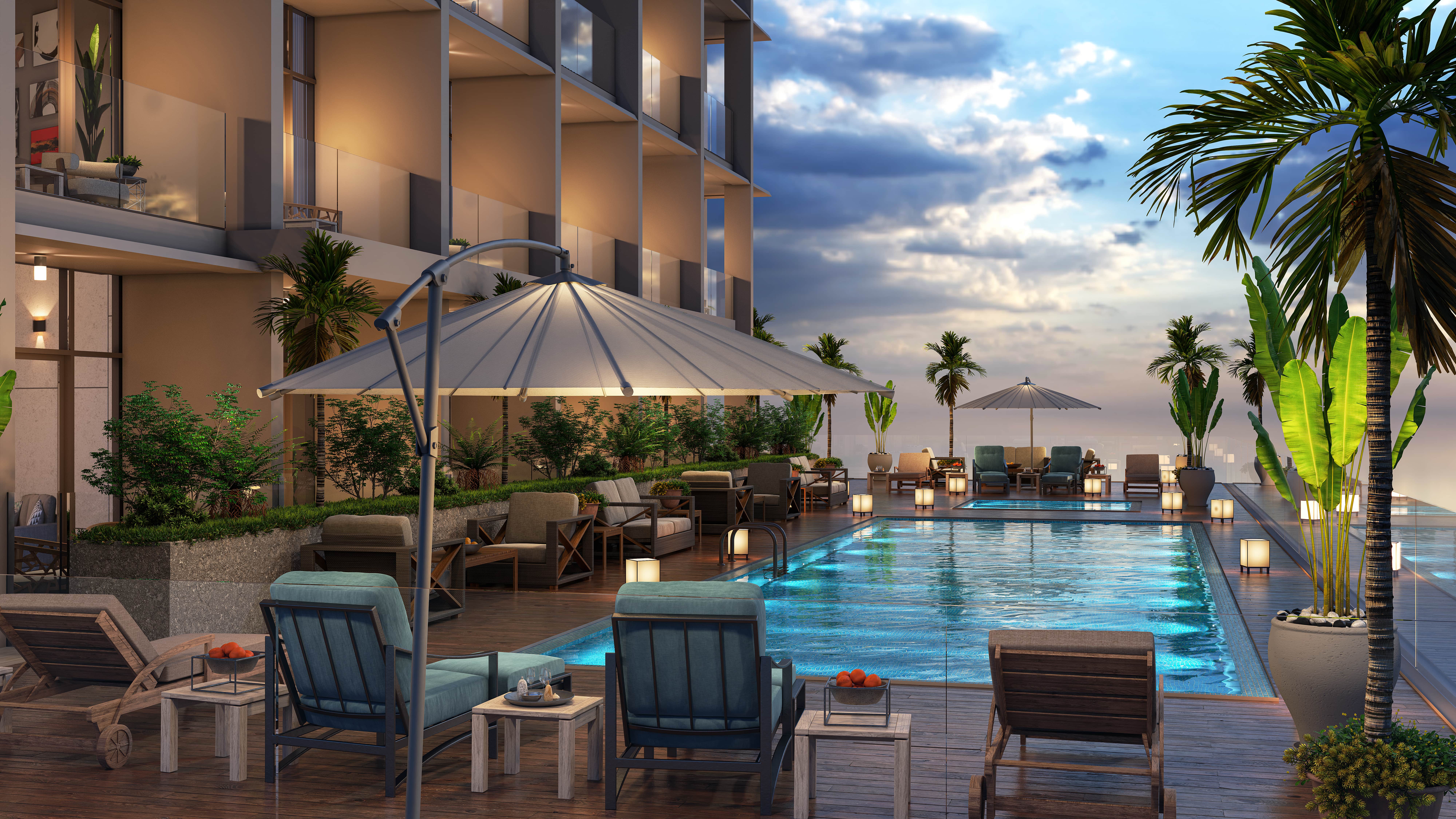 Hyde Walk By Imtiaz A luxurious pool area with sun loungers, umbrellas, lush plants, and modern decor, overlooking a beautiful skyline.